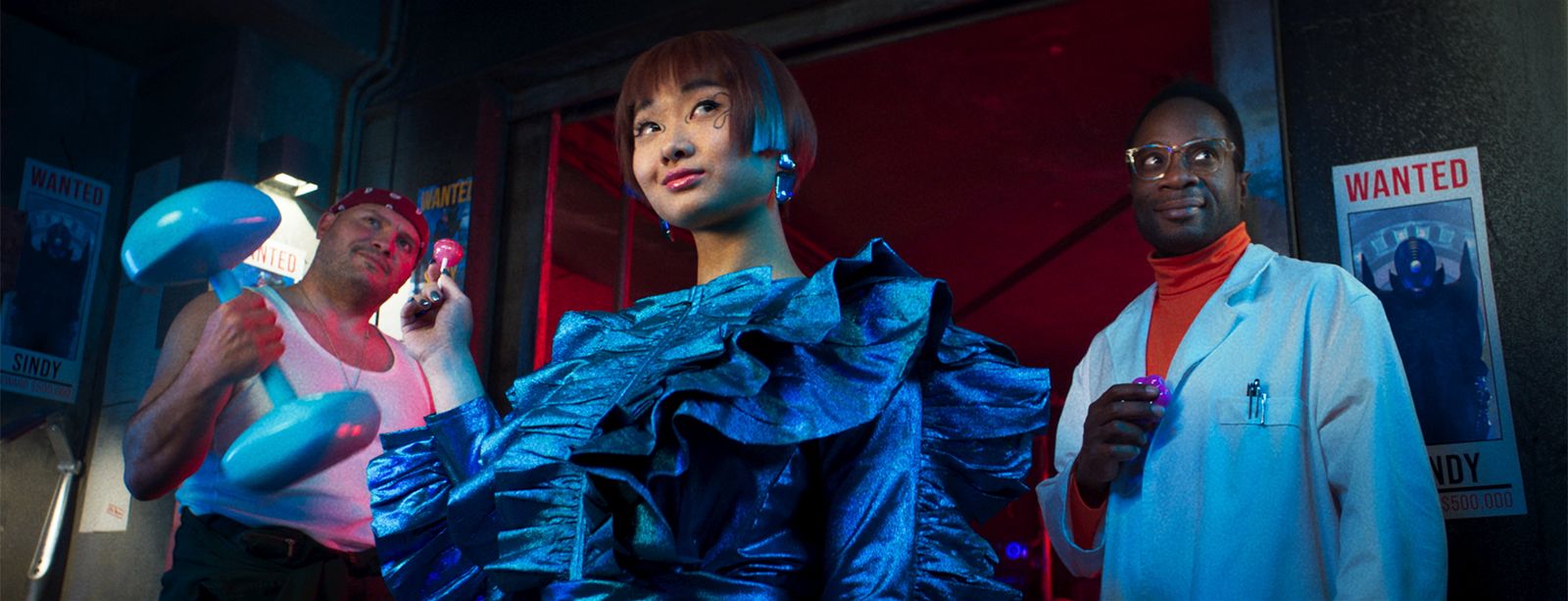 a group of three women standing next to each other