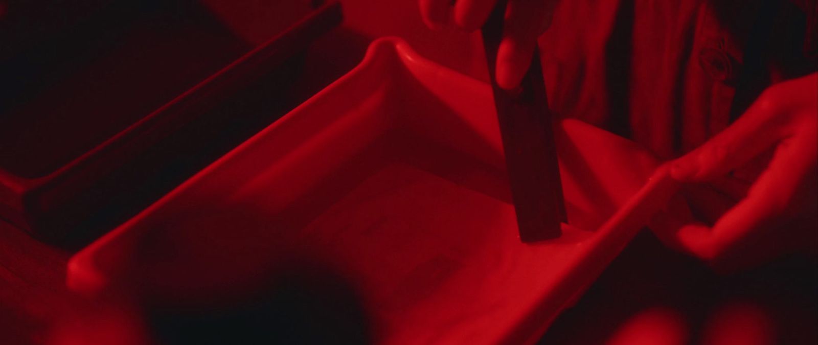 a close up of a red object in a room