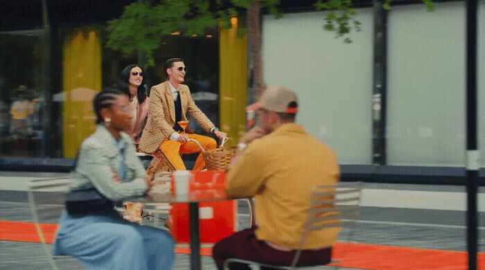 a group of people sitting around a table