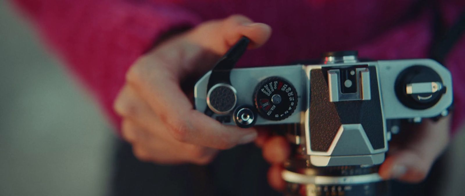 a person holding a camera in their hands