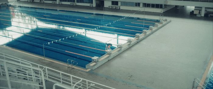 a large swimming pool in a large building