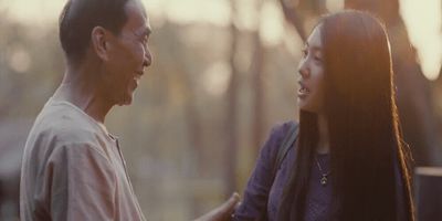 a man and a woman standing next to each other