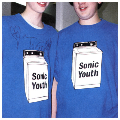 two boys wearing sonic youth t - shirts in front of a mirror