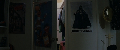 a door with a darth vader poster on it