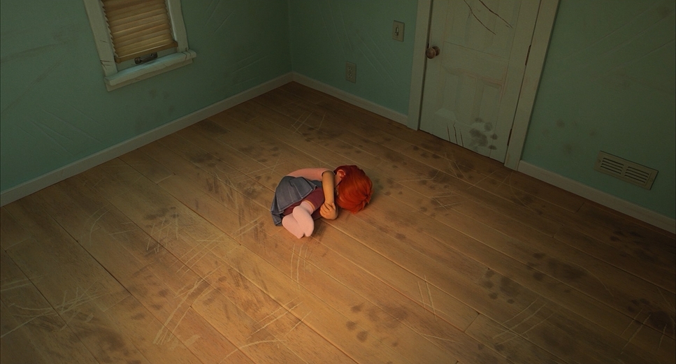 a child laying on the floor in a room