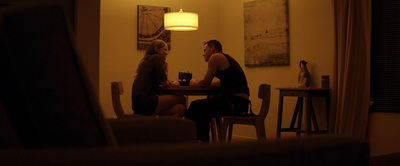 a man and a woman sitting at a table