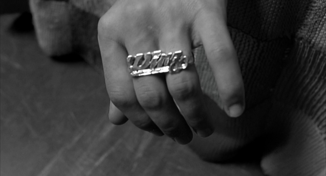 a person with a ring on their hand