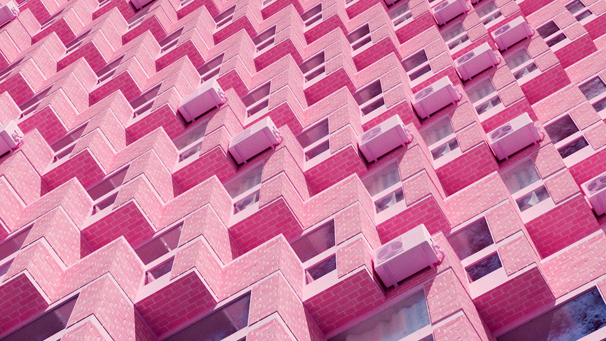 a pink building with a lot of windows