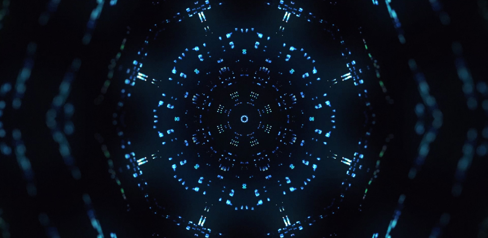 an abstract blue and black background with a circular design