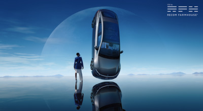 a man standing in front of a futuristic car