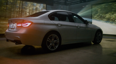 a silver car parked in a parking garage