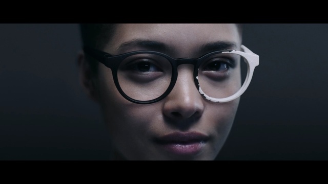 a woman with a pair of glasses on her face