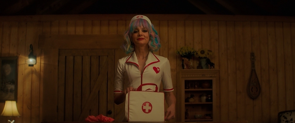 a woman in a nurse outfit holding a box