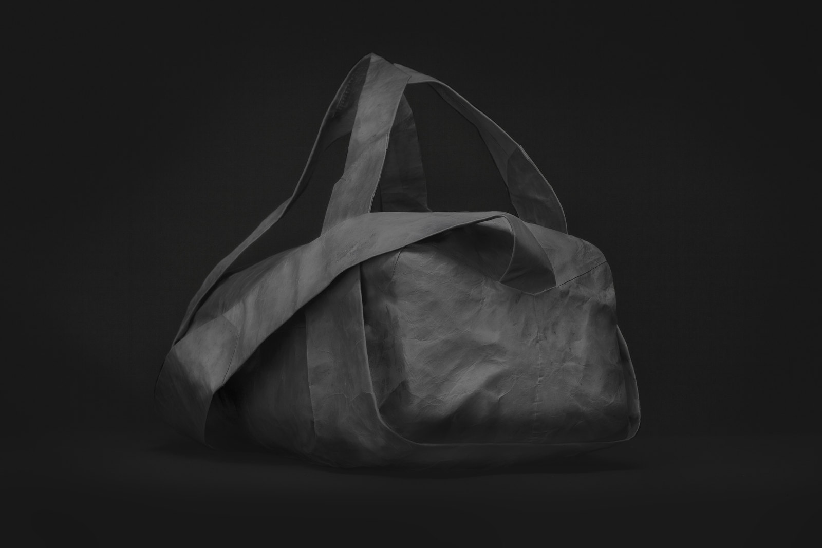 a black and white photo of a bag