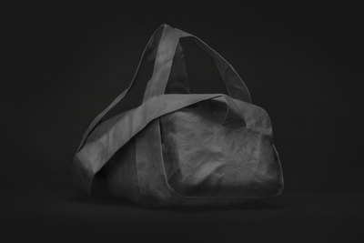 a black and white photo of a bag