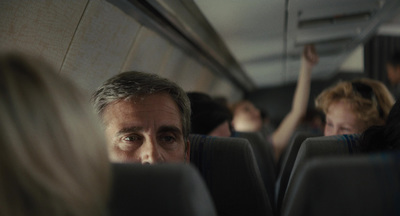 a group of people sitting on a bus