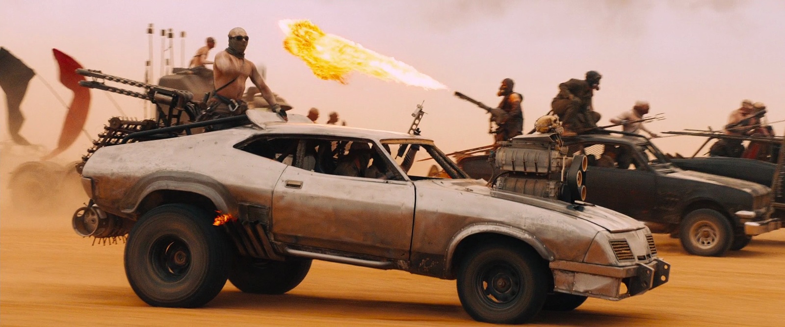 a group of people riding on the back of a truck