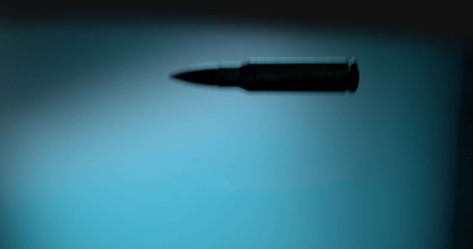 a close up of a black object with a blurry background