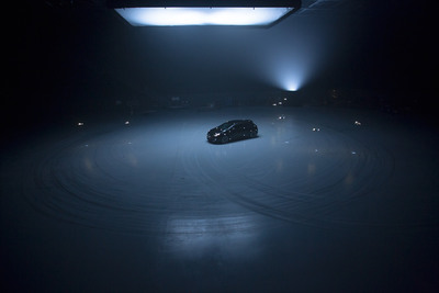 a car is parked in a dark parking lot