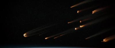 a group of rockets flying over the earth