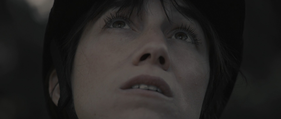 a close up of a person wearing a hat