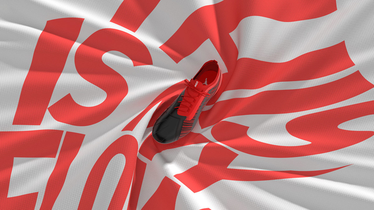 a pair of red shoes sitting on top of a red and white flag