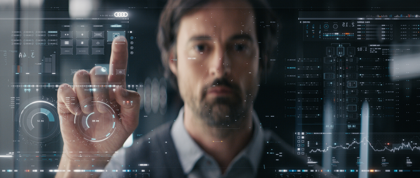 a man touching a virtual interface with his finger