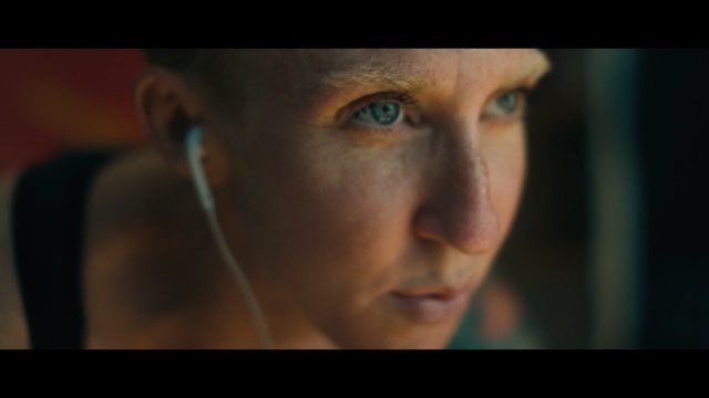 a close up of a person with ear buds