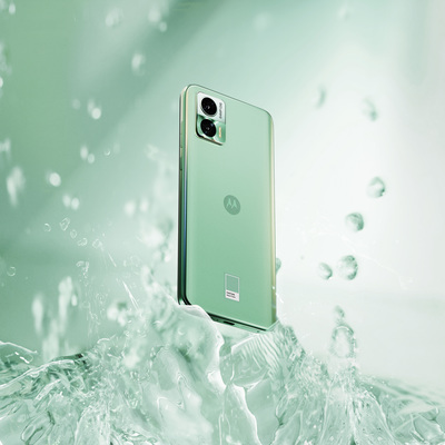 a close up of a cell phone in the water