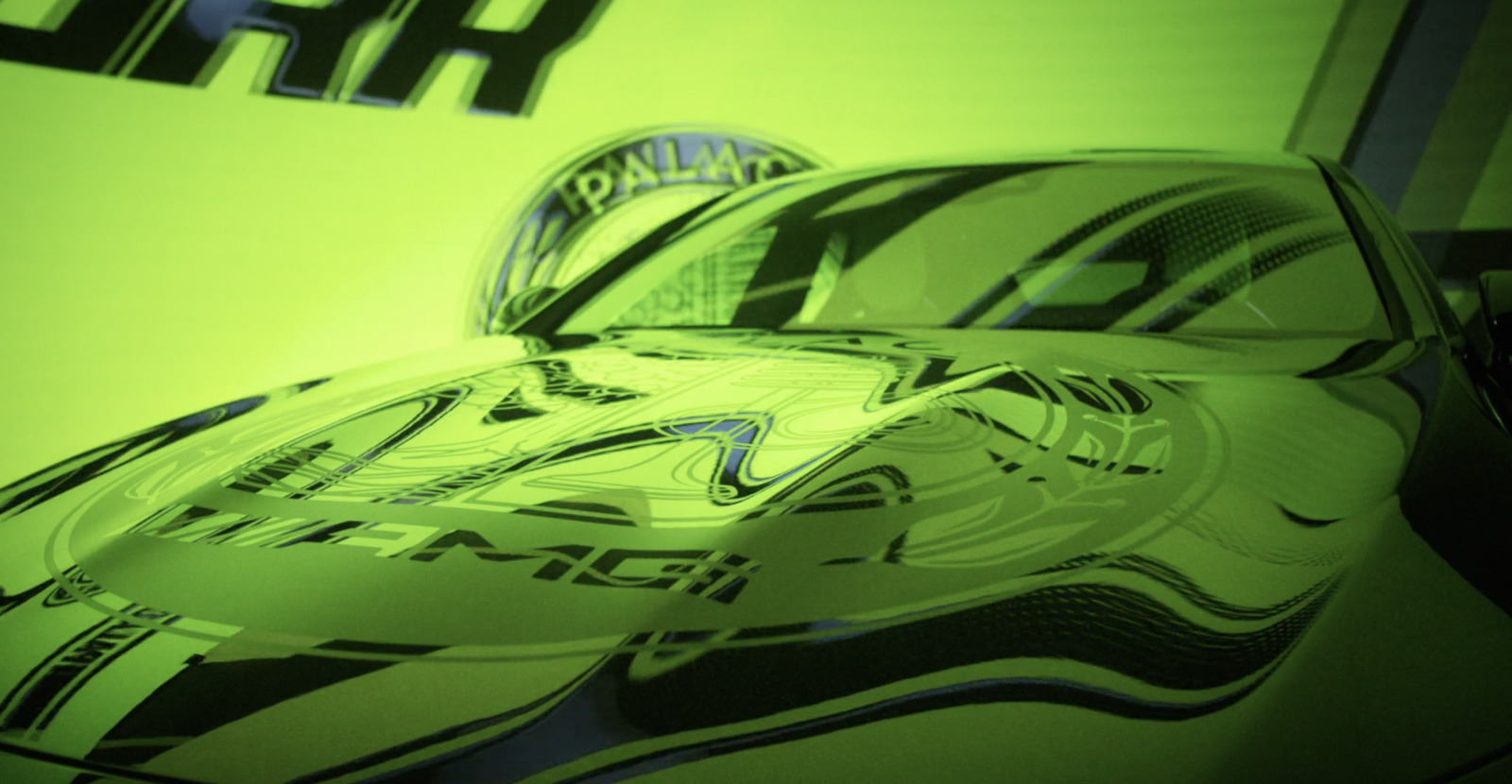 a close up of a car on a green background