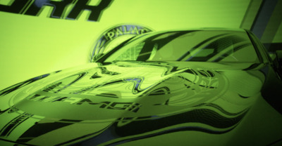 a close up of a car on a green background