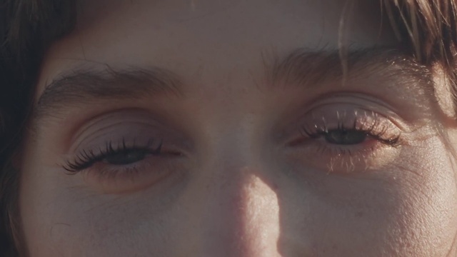 a close up of a person's eyes with long lashes