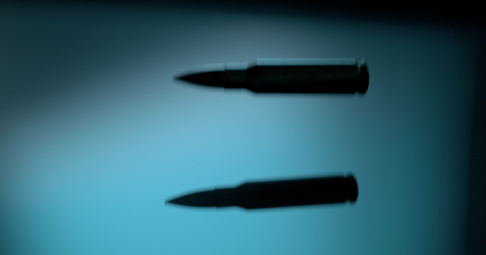 a close up of a pen with a blurry background