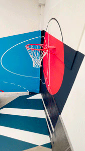 a basketball hoop in the middle of a basketball court