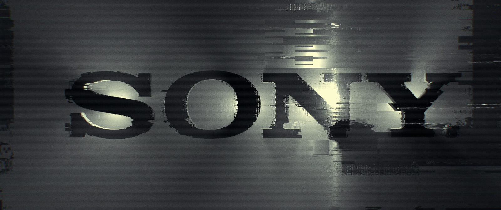 a black and white photo of the word sony