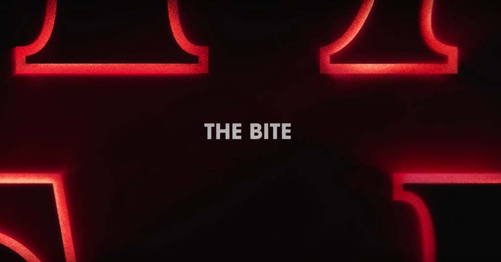 a red neon sign that says the bite