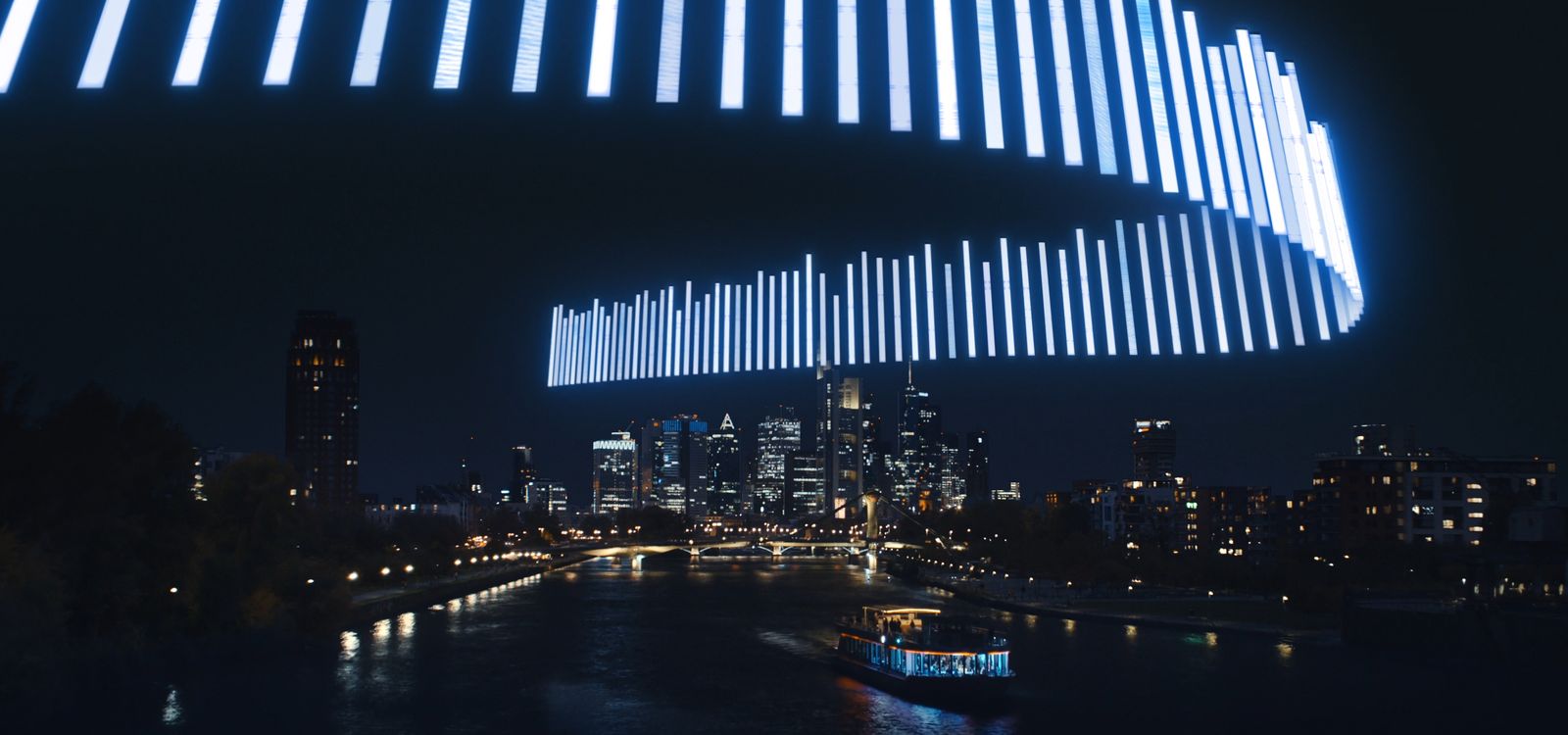 a city skyline is lit up at night