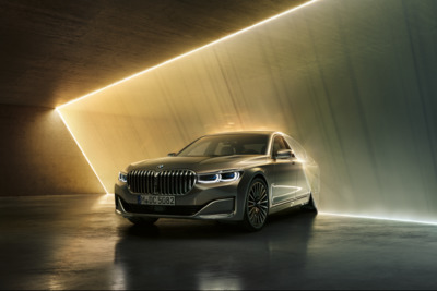 a silver car is parked in a tunnel