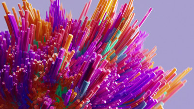 a bunch of different colored straws in a vase