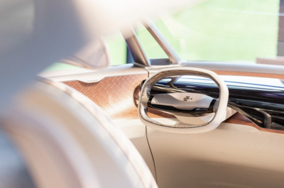 the interior of a car with the door open