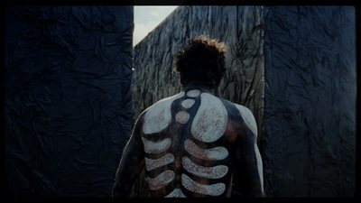 a man with a skeleton painted on his back