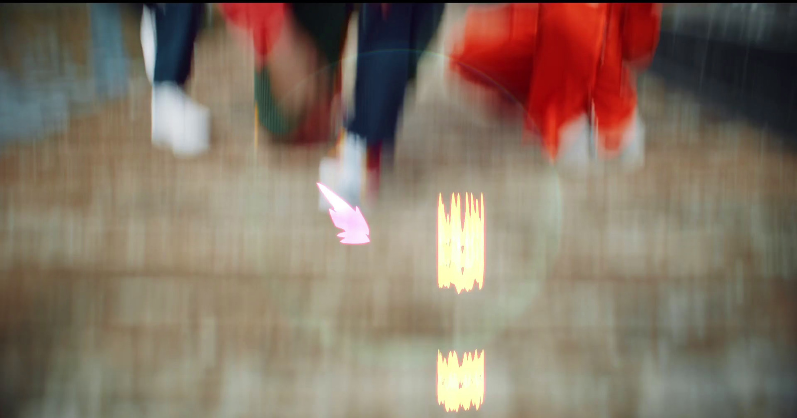 a blurry photo of people walking in the rain