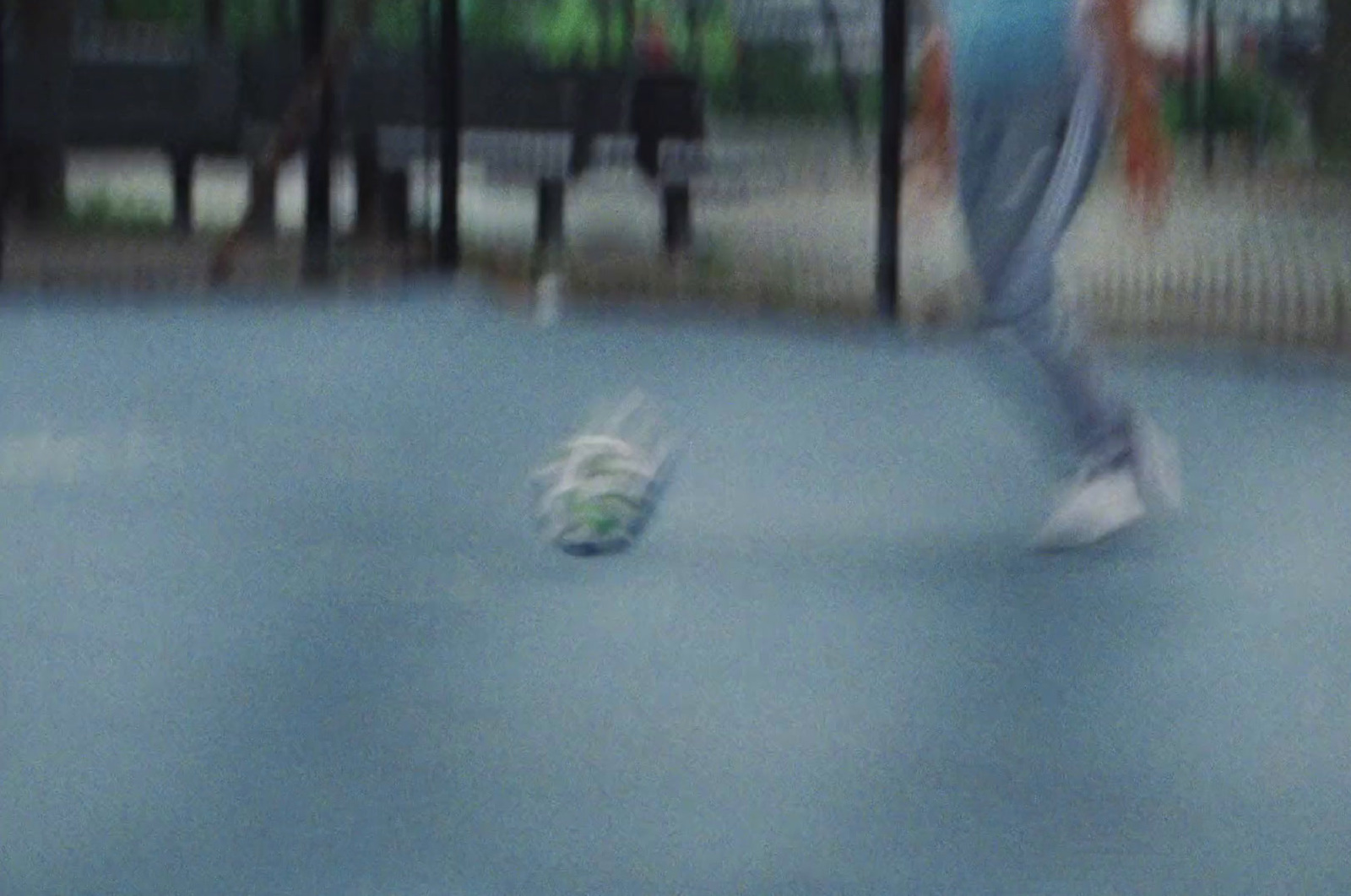 a blurry photo of a person playing tennis