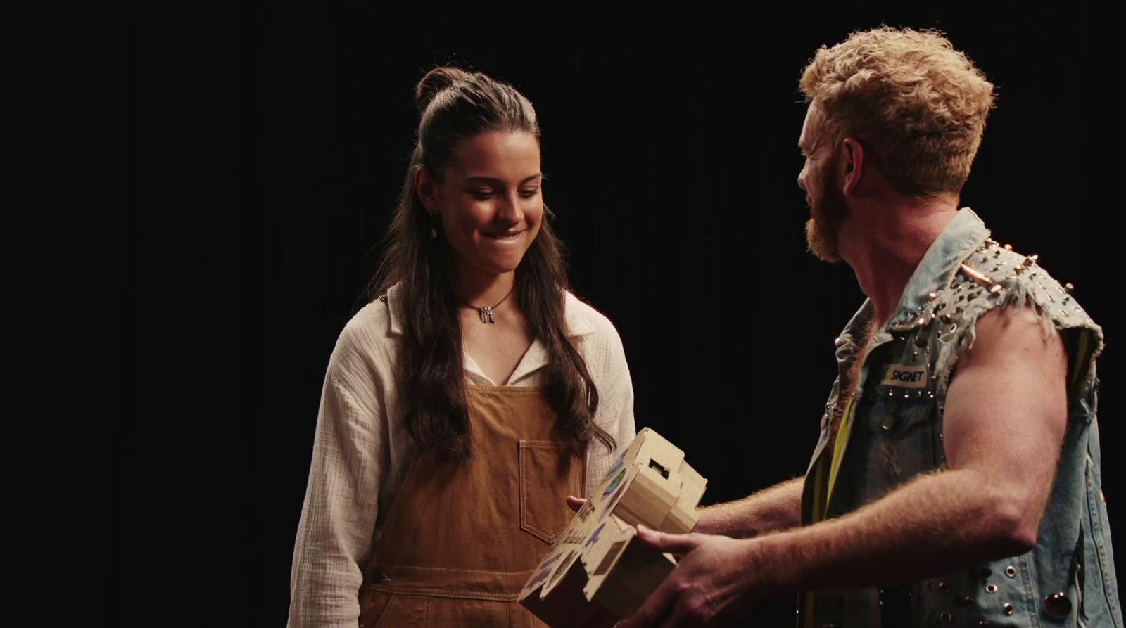 a man and a woman standing next to each other