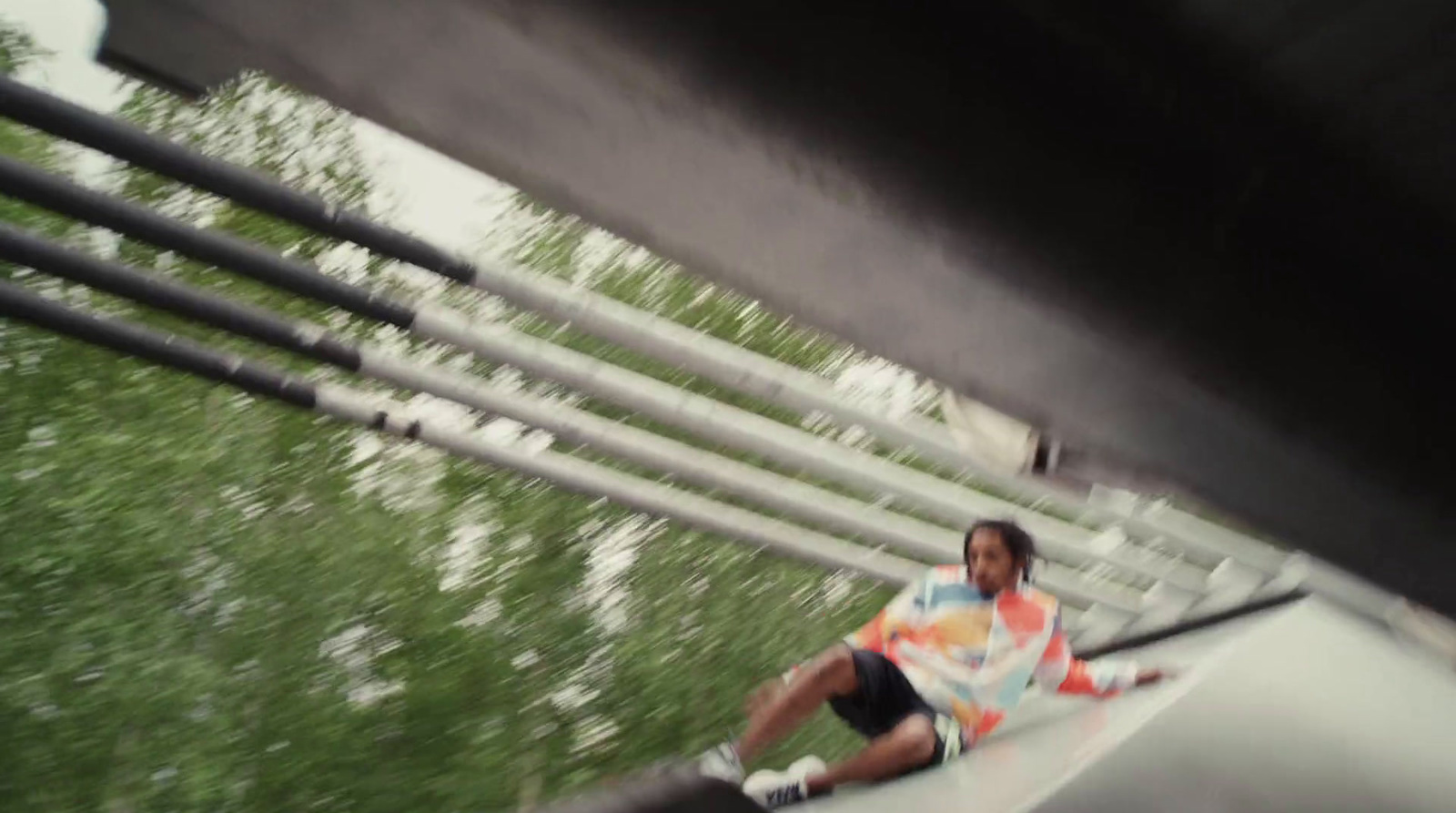 a man riding a skateboard down the side of a ramp