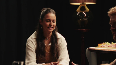 a man and a woman sitting at a table