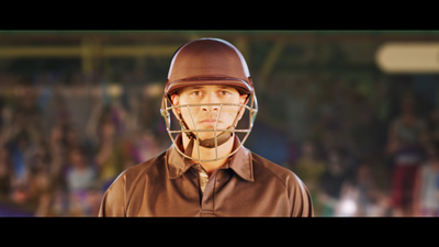 a man wearing a helmet and holding a baseball bat