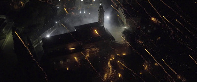 a view of a city at night from a bird's eye view