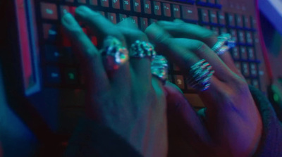 a close up of a person typing on a keyboard