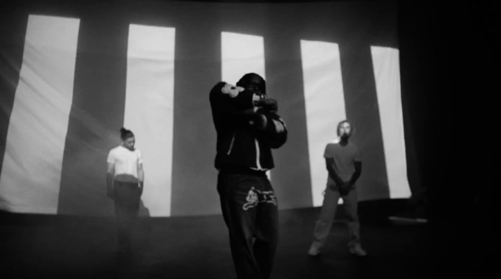 a man taking a picture of himself in a black and white photo